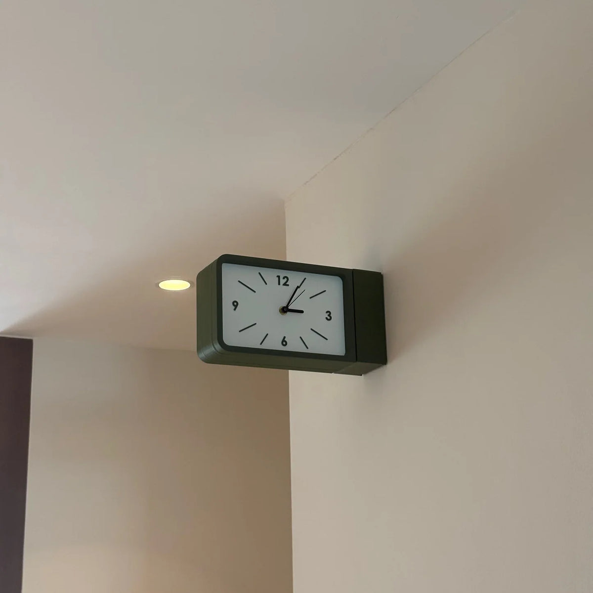 Dual sided wall clock